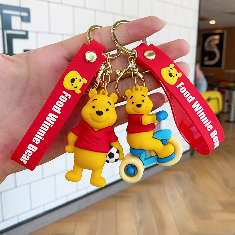 Creative Sports bear Pooh bear keychain flexible glue three-dimensional doll compact bag pendant hanging decoration push gift