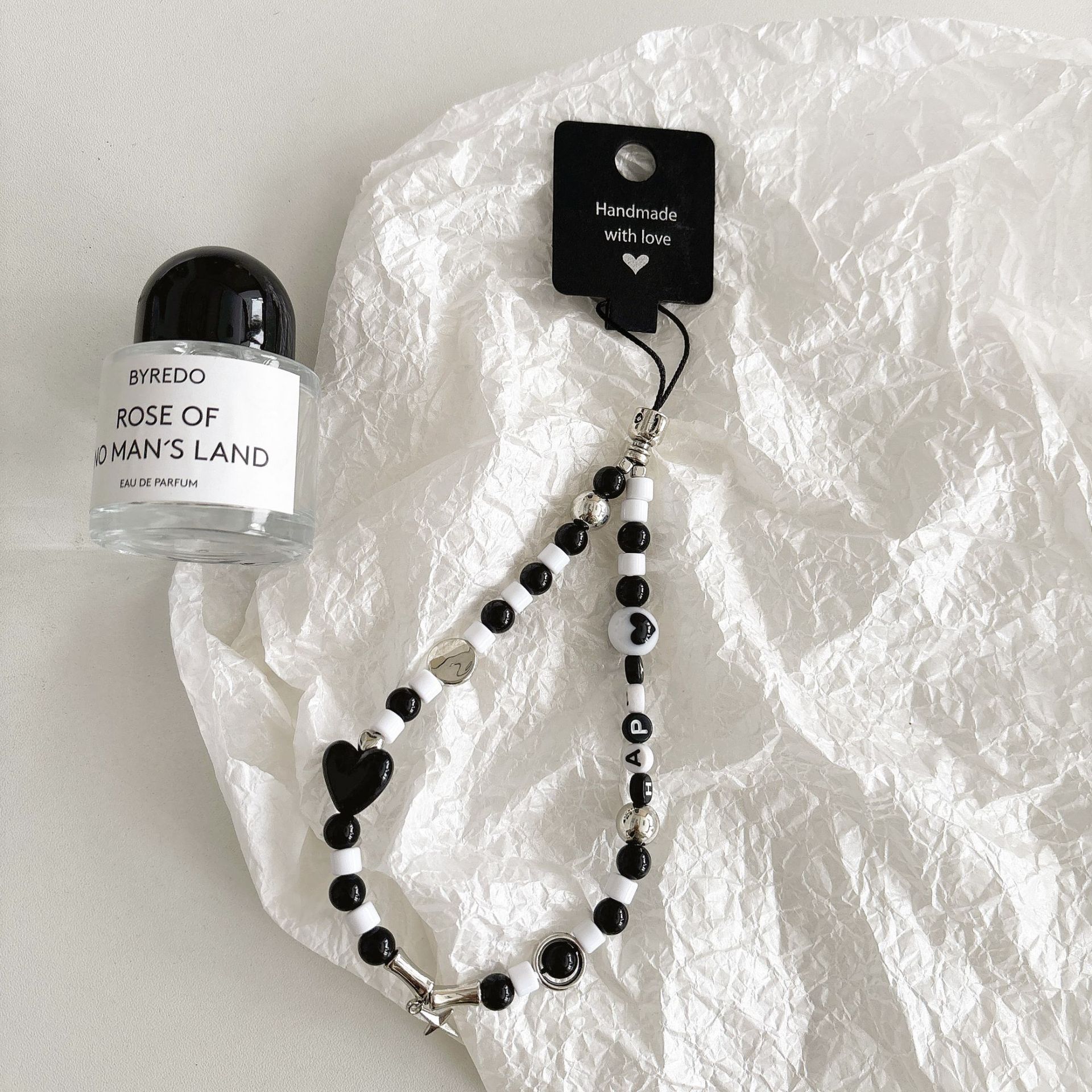 Cuentas de perlas hechas a mano, cadenas de teléfonos móviles, bolsos, colgantes, colgantes de muñeca, cuentas hechas a mano.