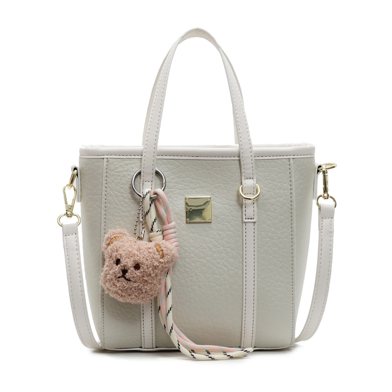 Bolsa de cubo de mano de comercio exterior para mujeres 2025 nuevo nicho de diseño exterior bolso de hombro de estilo universal bolso de mochila de moda casual