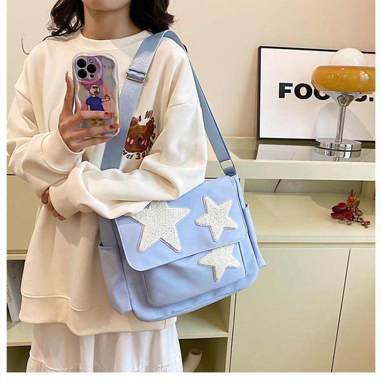 Cross-border wholesale large-capacity five-pointed star canvas single-shoulder bag, cute school style crossbody bag, student commuting bag for classes full figure