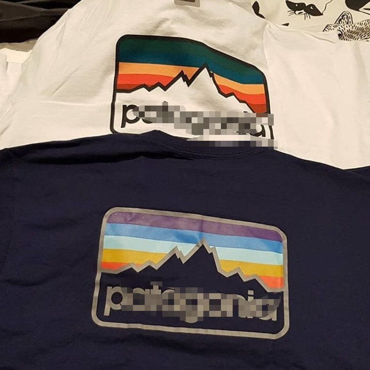 Estilo americano Patagonia al aire libre montaña serie hombres y mujeres del mismo estilo popular verano Camiseta de manga corta