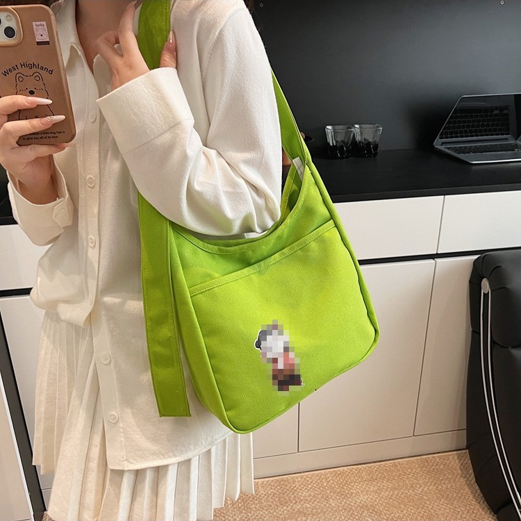 2025 nuevo bolso de lona bolso de hombro de gran capacidad para mujer bolso casual de todo fósforo para estudiantes en clase bolso de viaje