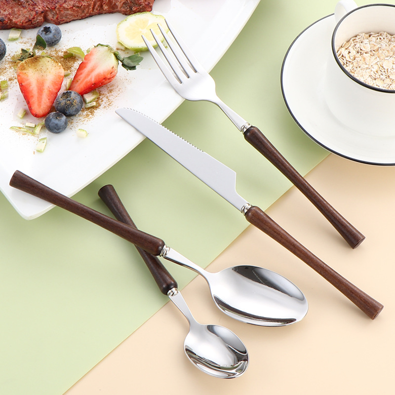Cross-border 304 mango de madera de acero inoxidable cintura pequeña brillante alas de pollo cuchillo de madera tenedor cuchara de cubierta occidental cuchillo de filete conjunto de cuatro piezas