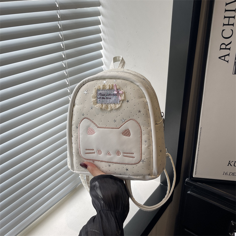 2026 nueva universidad estampada estrella mini mochila de estudiantes niña caricatura gato mochila pequeña