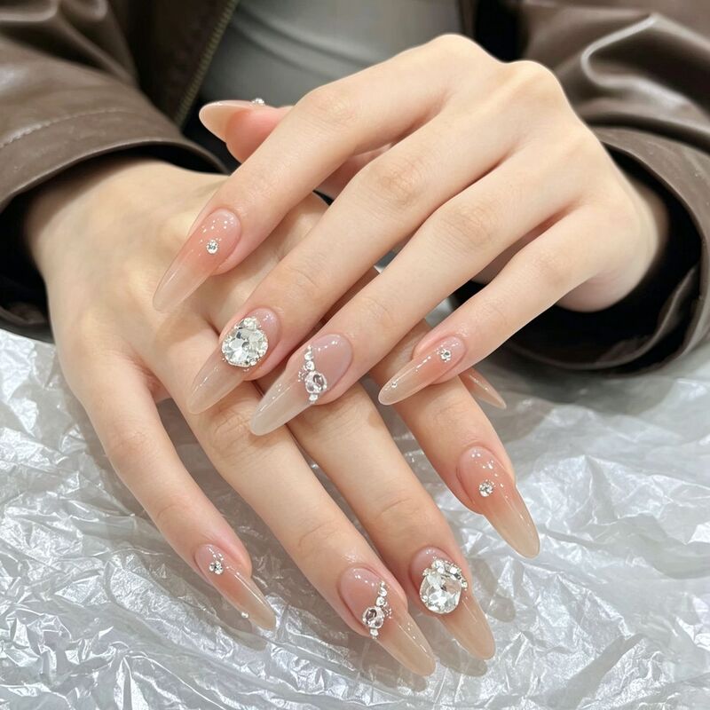 Hot-selling handmade nail art, minimalist nude color, dazzling and high-end design, whitening effect, long water drop-shaped press-on nails, wholesale
