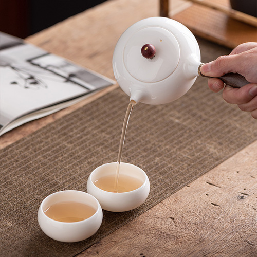 High-end mutton fat jade porcelain side handle teapot single pot Xishi pot household Kung Fu tea set filter teapot simple wholesale