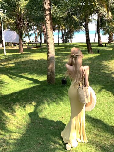 Charming and alluring maxi dress with off-shoulder design, perfect for summer, featuring a stylish French seaside vacation vibe, featuring a fishtail silhouette and a fish-shaped, flattering fit-and-flare design.