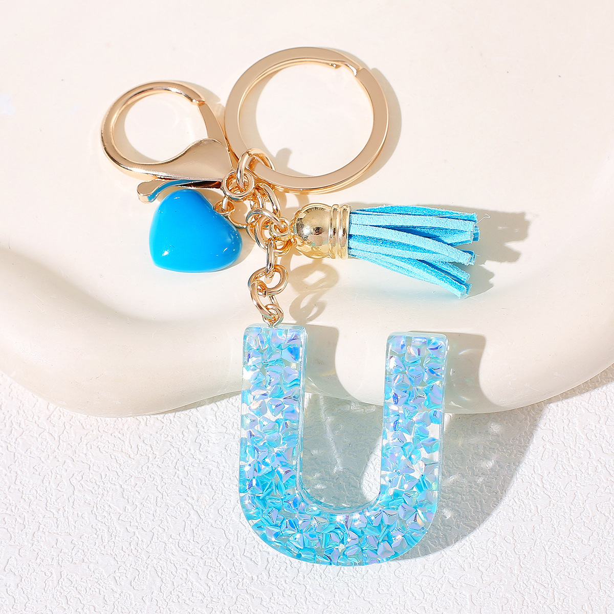 Nuevos productos azules de amor con frascos de letras lindos enclavadores decoraciones europeas y americanas populares llaveros damas