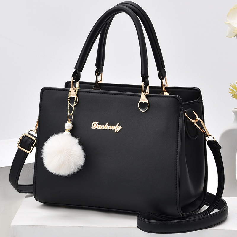 Bolsos populares para mujeres 2025 verano nueva moda bolso de hombro para mujer de mediana edad bolso elegante para mamá bolso versátil.