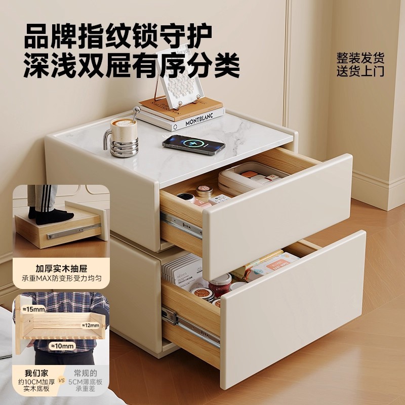 Mesa de cabecera de madera maciza dormitorio doméstico 2025 explosión ligera de lujo de alto nivel sensación de viento crema pequeño gabinete de almacenamiento de la cama inteligente
