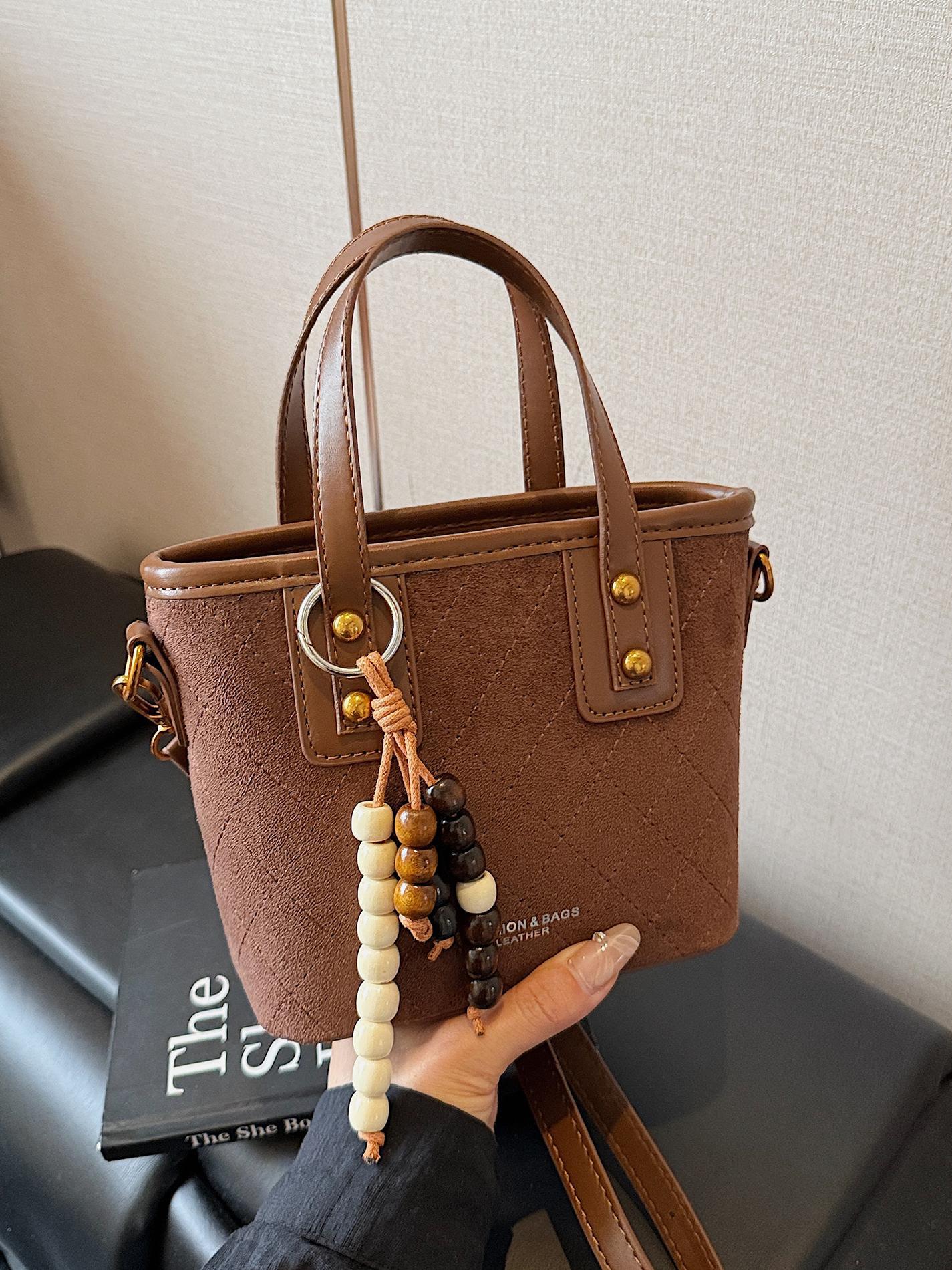 Transfronterizo retro gamuz bolsas de cubo de mano para mujeres 2025 nuevo estilo universal