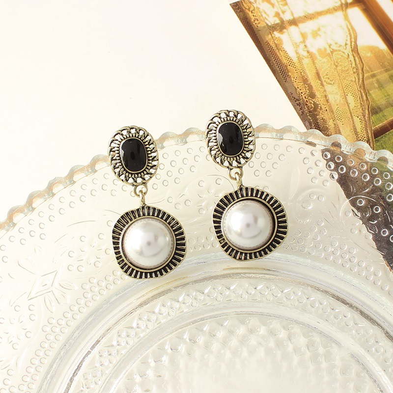 Pendientes de suministro de mercado nocturno de agujas de plata Pendientes de moda coreana en vivo Pendientes de estilo caliente Pendientes de lujo ligero Mujeres de alta gama