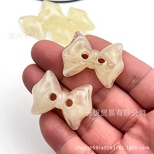 新款树脂蝴蝶结两眼纽扣卡通风百搭大衣毛衣毛呢门襟外套装饰扣