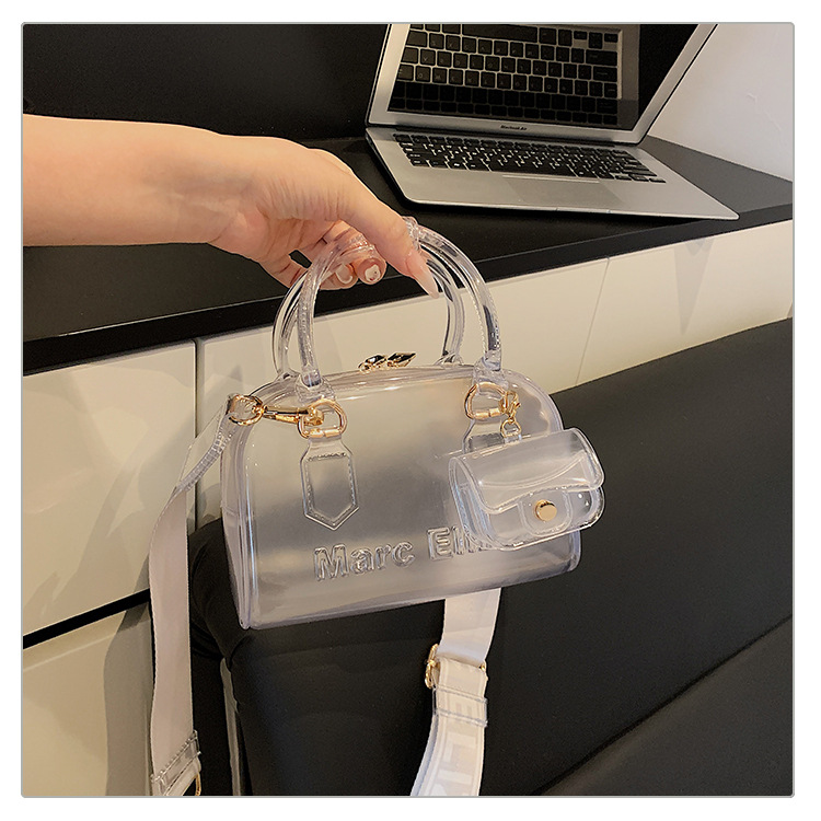 Verano nuevo bolso de almohada portátil de PVC transparente de jalea para mujeres este año popular alta textura mochila de hombro