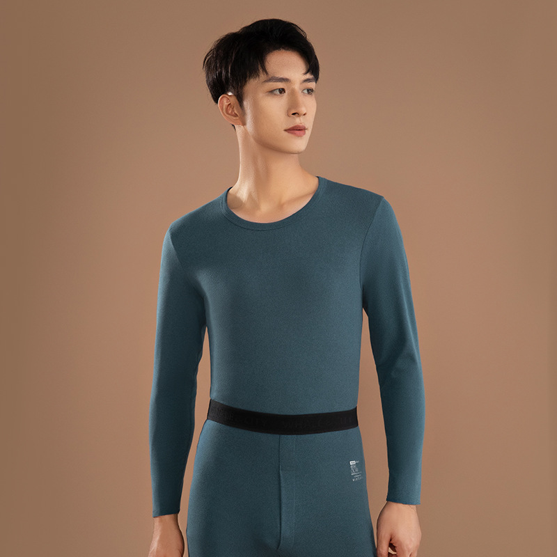 Ropa interior térmica de los hombres Calzoncillos largos finos de calefacción sin costuras traje de los hombres jóvenes de color sólido cuello redondo terciopelo Calzoncillos largos