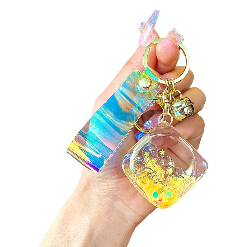 Nuevo llavero de dados luminosos con aceite, cuentas de burbujas, dados, colgantes de botella de arena de cristal, colgantes de bolsas al por mayor