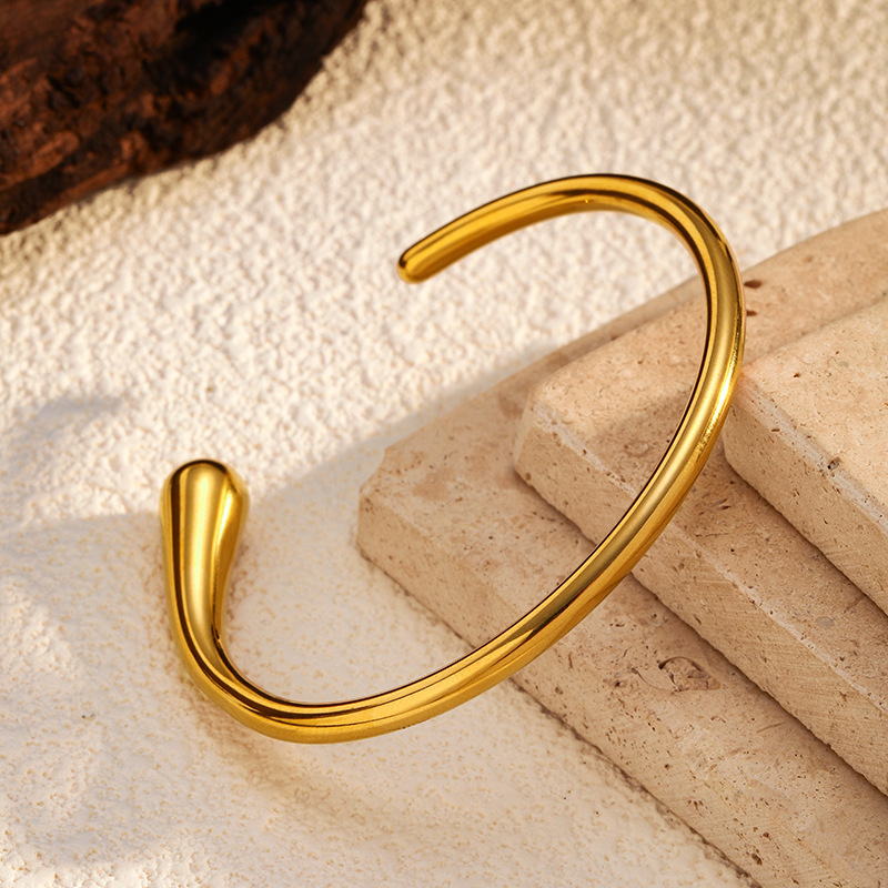 2024 pulsera abierta de fundición de acero inoxidable, pulsera de textura redonda, joyería de acero de titanio de oro de 18 quilates al por mayor