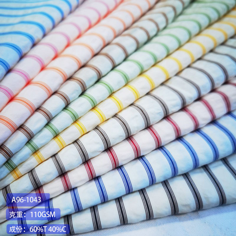 现货供应涤棉时尚男女衬衫连衣裙面料 色织条子面料 时尚条纹布料