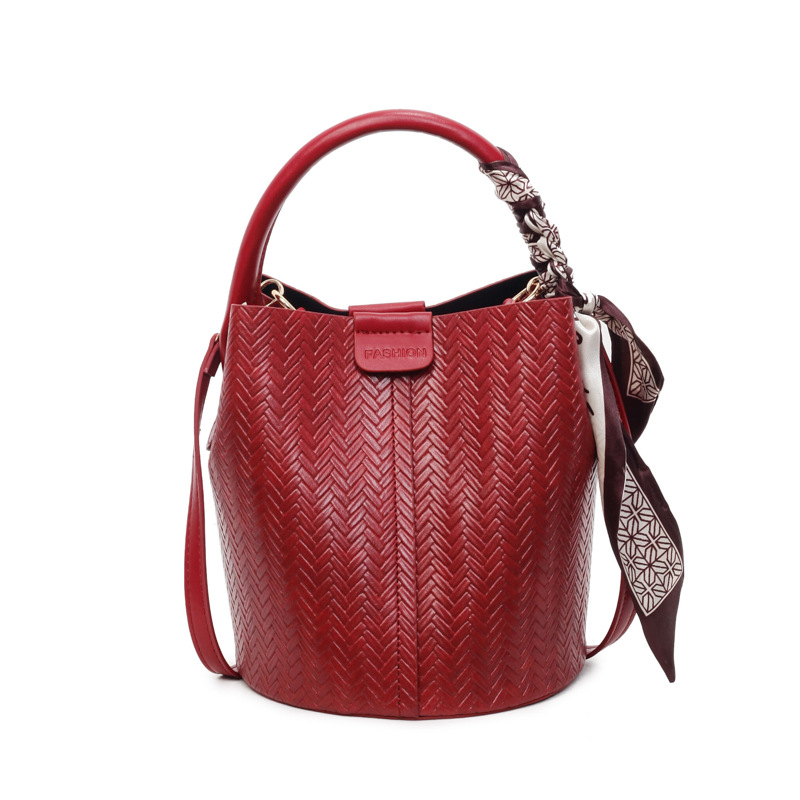 Bolso de mano transfronterizo retro simple bolso de cubo de agua mujer otoño / invierno 2025 nuevo estilo versátil bolso de hombro bolso de transporte