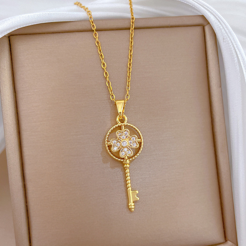 Luxurious Rotating Lucky Key Necklace With Full Diamond Inlay_voghion.com