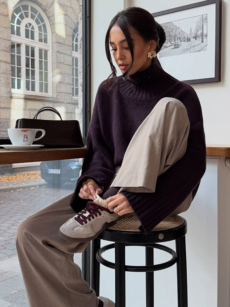 Un alto sentido de moda simple temperamento delgado color sólido de cuello alto suéter de manga larga otoño y invierno 2025 nuevo estilo transfronterizo europeo y americano