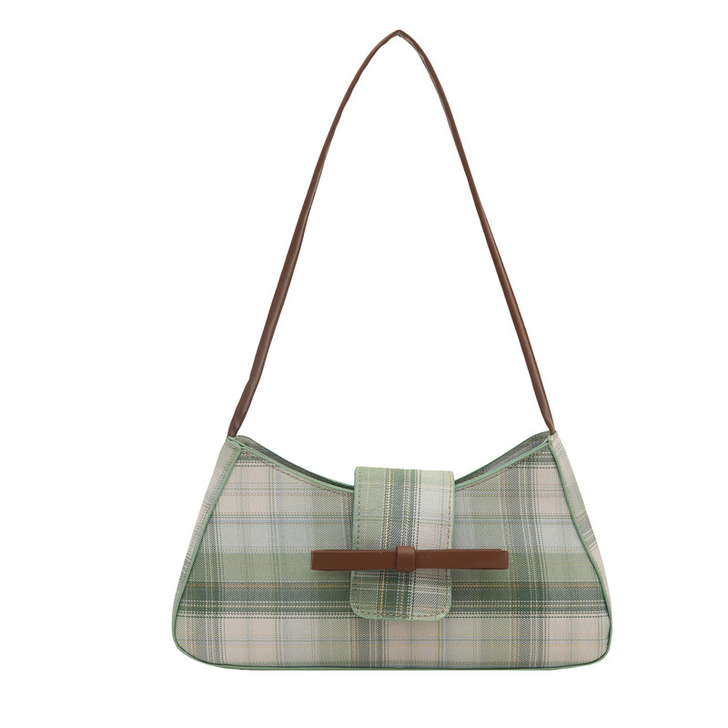 Moda personalidad hermosa versión coreana del bolso de la axila del palo francés 2025 lazo femenino moda nuevo bolso a cuadros de un solo hombro