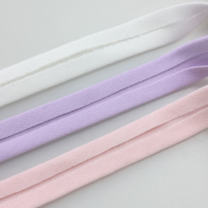 Banda de bordes de tela de borde rodante ropa de bebé tela de sudor algodón accesorios de punto elástico no quemado decoración de bebé cerradura Vance