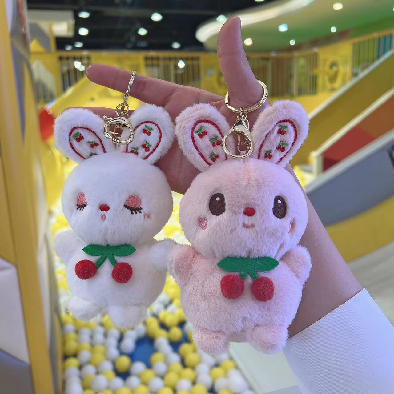 Linda chica de dibujos animados corazón conejo muñeca llavero conejo mochila colgante pequeña muñeca chica boda muñeca al por mayor