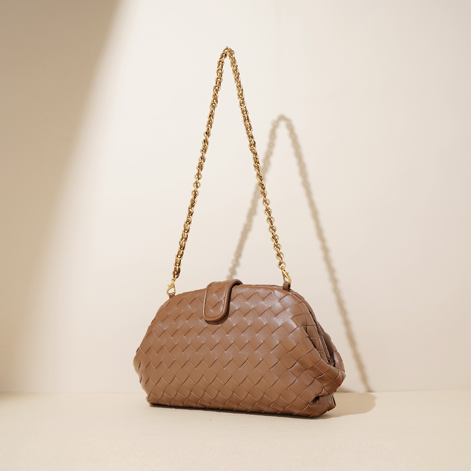 Woven leather one-shoulder bag