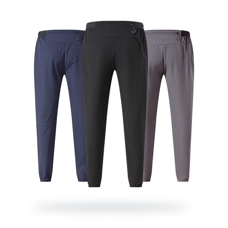 Pantalones deportivos Otoño de los hombres al aire libre de secado rápido pantalones sueltos de nylon tejidos tobillo atado pantalones casuales fitness correr Pantalones