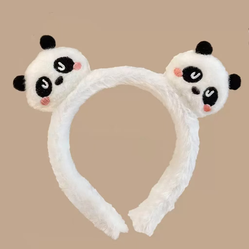 男女通用の大きいパンダのカチューシャは卸売りします。