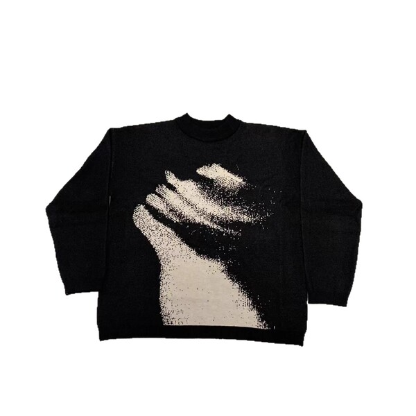 Elegant demi-season knitted sweater with a round collar