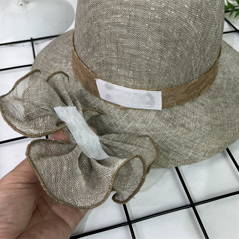 Sombrero femenino verano Lino moda sombrero de sol estilo occidental arco pescador sombrero casual protección solar sombrero de la madre sombrero retro cuenca
