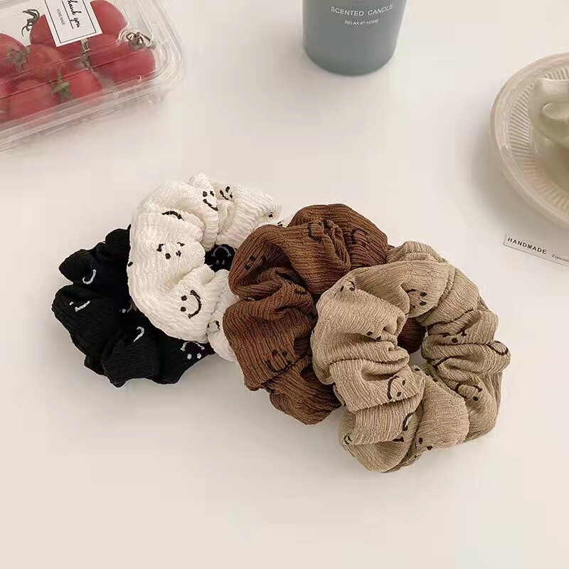 Autumn and winter smiling face large intestine hair Ring 2 yuan shop Korean hair accessories headdress simple milk tea color large intestine ring female hair rope