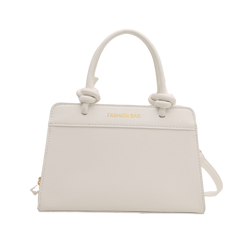 Bolso pequeño portátil retro estilo occidental mujer 2025 nuevo bolso cuadrado pequeño simple moda moda color contraste bolso de hombro