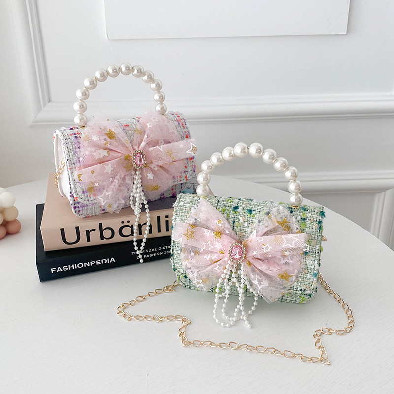 New-style kids' coin purse, trendy princess backpack with a cute bow accessory for girls, featuring pearl-embellished chain and crossbody design.