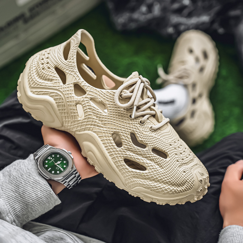 Comercio exterior transfronterizo zapatos con agujeros para hombres 2025 nueva playa moda de verano sandalias zapatillas zapatos de cabeza al por mayor