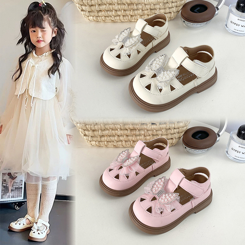 Baotou sandalias para niños 2026 verano nuevo bebé brillante perforación arco suave hueco zapatos de cuero sandalias princesa