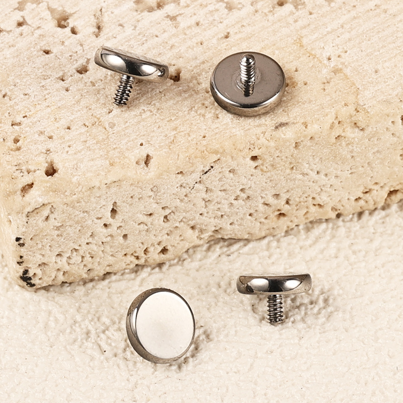 Silver pointed spike labret stud material detail