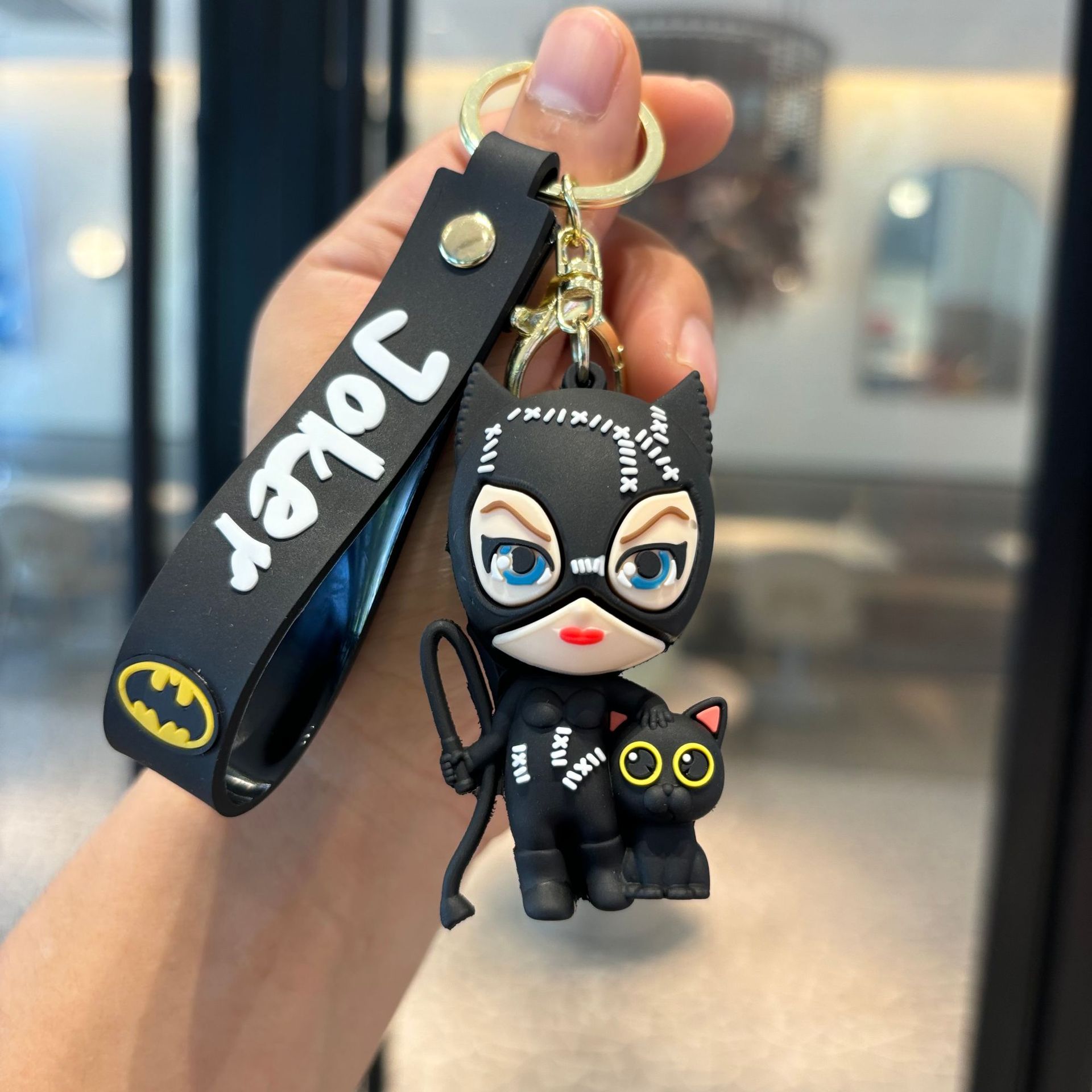 Batman cruzado superhéroes clown muñeca coche llavero colgante muñeca máquina de regalo pequeño