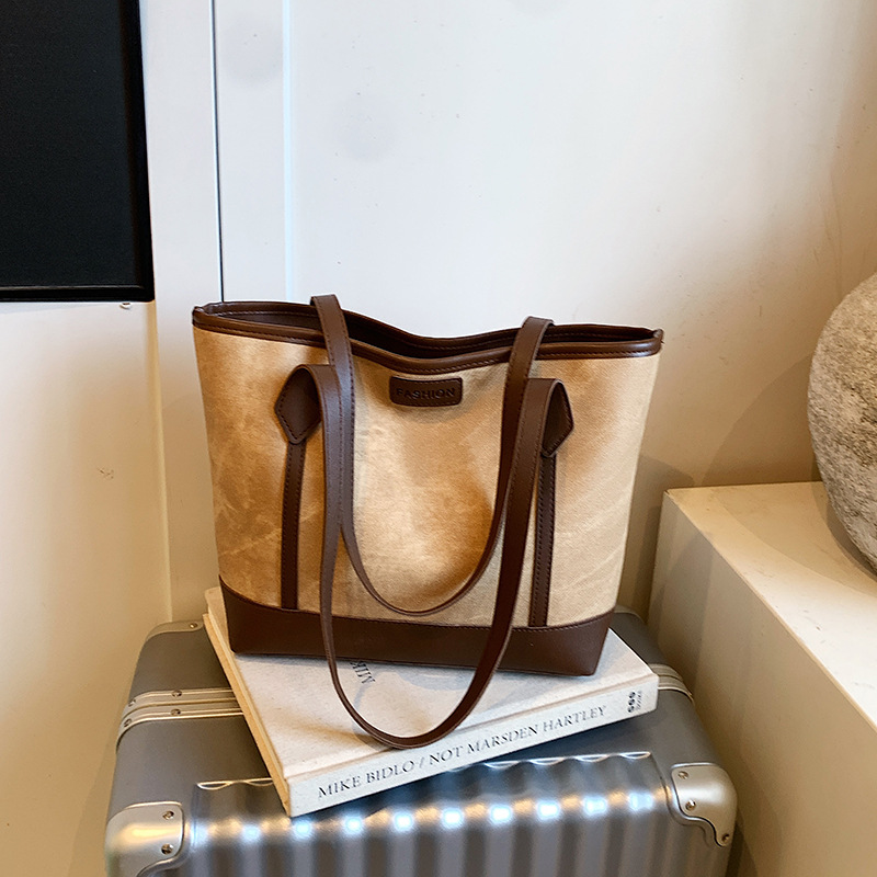 Bolsas de viaje de moda de gran capacidad de mujeres otoño 2025 nueva bolsa de hombro de estilo extranjero bolsas de mano universitarias