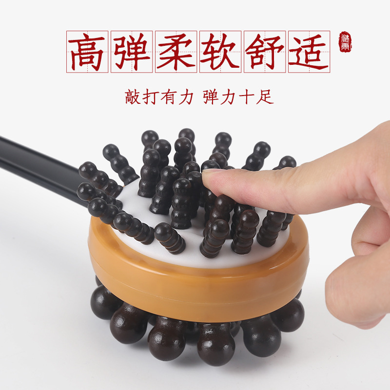 Cabeza redonda de mano golpeando hacia atrás masaje martillo meridiano masaje palo golpeando cuello hombro rascarse hacia atrás artefacto