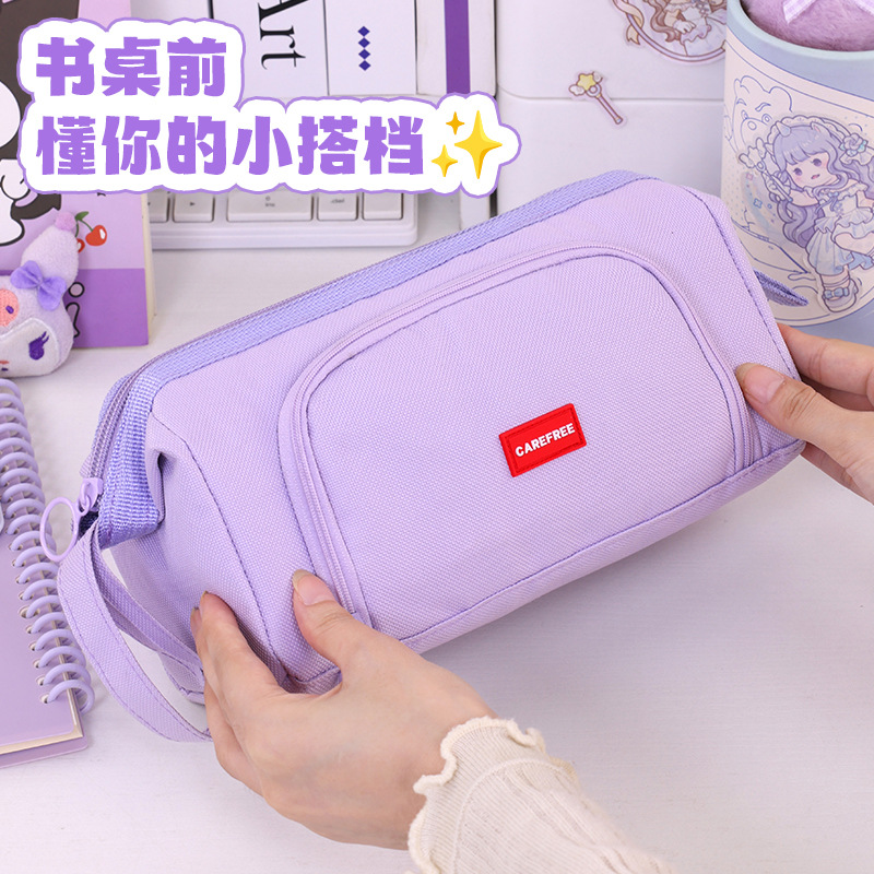 Bolsa de bolígrafo simple de gran capacidad de comercio exterior caja de papelería de color sólido multicapa de tela Oxford sucia caja de lápiz para niños y niñas