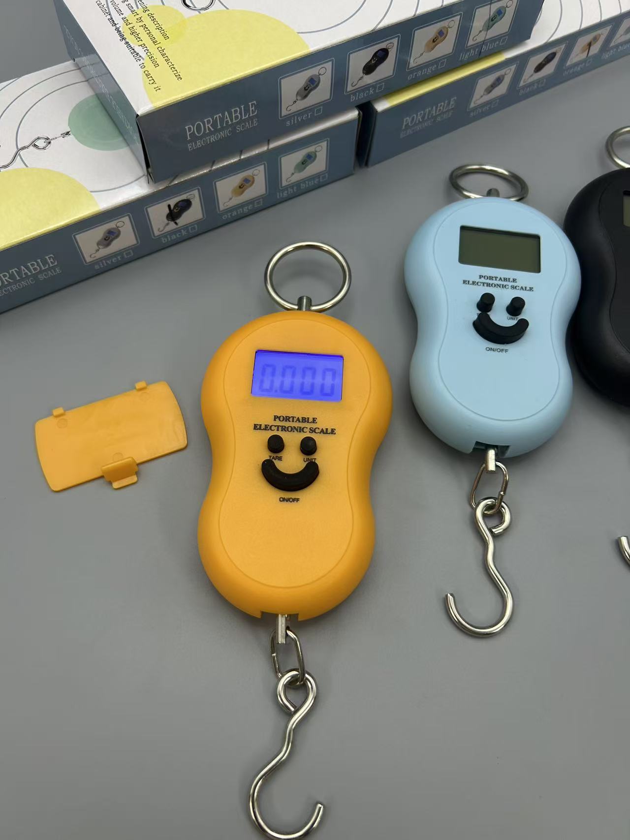 Elektronik terazi toptan satış ev tipi taşınabilir el tırmığı elektronik tartı taşınabilir mini bagaj el tırmığı hızlı kargo tartısı