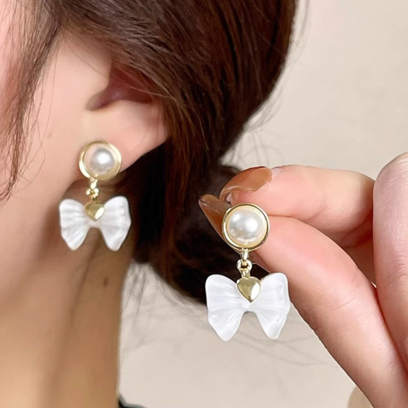 1 Paire Élégant Style Coréen Noeud D'arc Incruster Alliage Perles Artificielles Boucles D'oreilles display picture 2