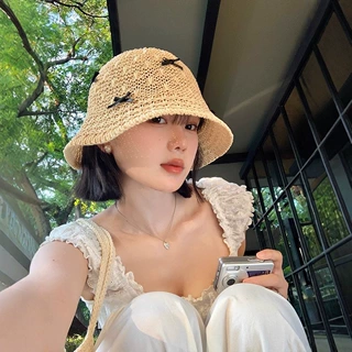 甜美蝴蝶结手工编织渔夫帽子女夏季镂空透气海边遮阳防紫外线盆帽