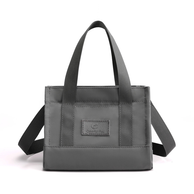 Bolsos de mujer de nylon impermeables transfronterizos, bolsos de moda y sencillos, bolsos de personalidad, compras ligeras, bolsos de hombro único portátiles