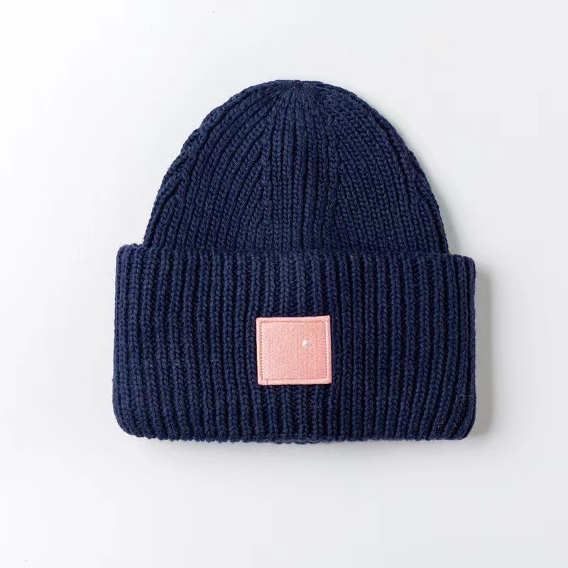 AC笑顔の帽子の四角のラベルを貼って、ウールの北欧風の冷たい帽子の韓国版のカップルの毛糸の帽子の高品質の冷たい帽子を巻きます。