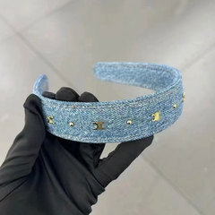 鞠婧は同じタイプのceデニムの青いリベットのカチューシャの女性が高くなります。