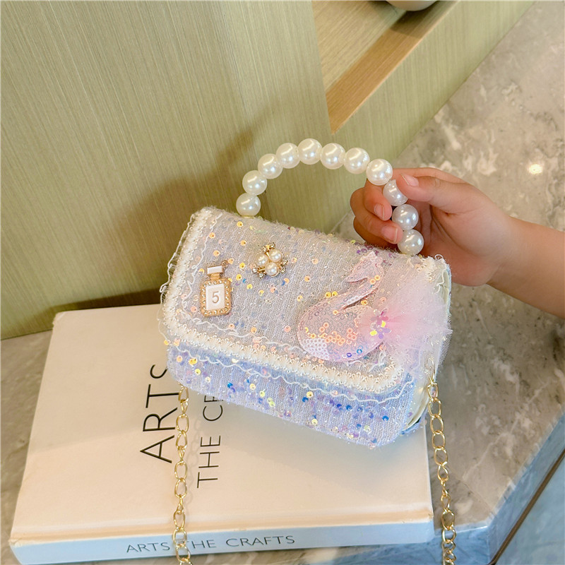 Nuevo estilo occidental de los niños bolsa de estilo de dibujos animados de las muchachas bolsa de mensajero estilo coreano perla bolso niñas monedero